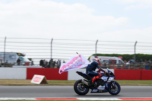 Kam flies the flag for friend Owen Jenner.