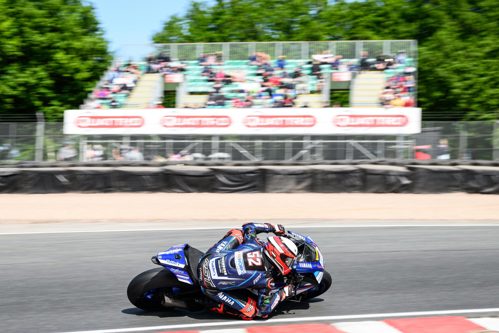 Kam Dixon heads around Lodge at Oulton Park.